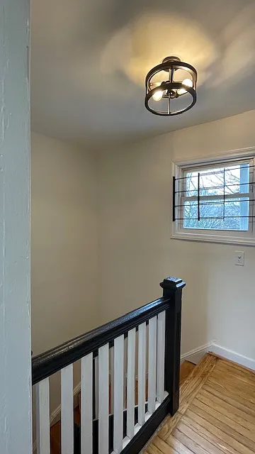 Top of stairway leading to hallway