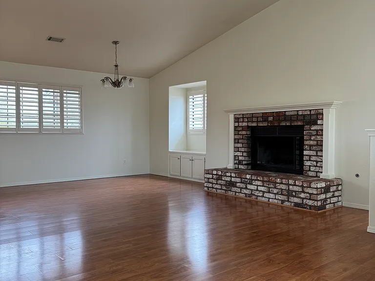 Living Room/Dining with Vaulted Ceiling and Beautiful New Gas Log Fireplace