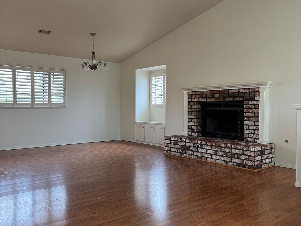 Living Room/Dining with Vaulted Ceiling and Beautiful New Gas Log Fireplace