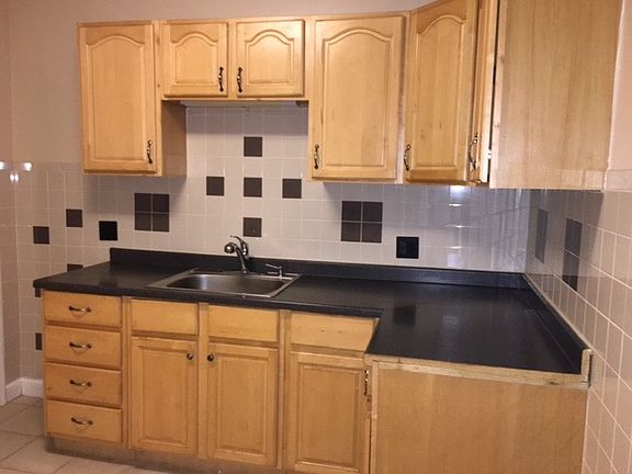 Kitchen with Cabinets and Sink