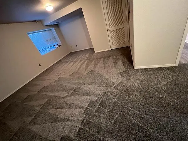 Large basement bedroom, with 3/4 bath at far right.