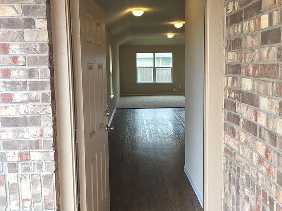 Main entrance with the front door open.
