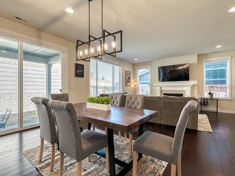 Another view of the dining area and the backyard patio access