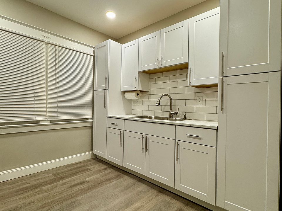 Brand new cabinets with slow close hinges, stainless steel sink and pulldown sprayer faucet accompany new countertops