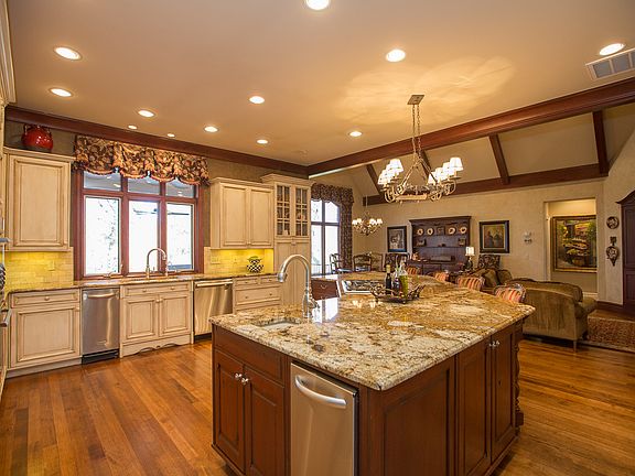 Gorgeous hardwoods, high-end appliances and massive granite island.