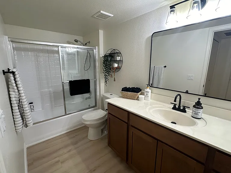 BATHROOM - Large bathroom with lots of storage, full-size bathtub/shower, blow dryer, new towels