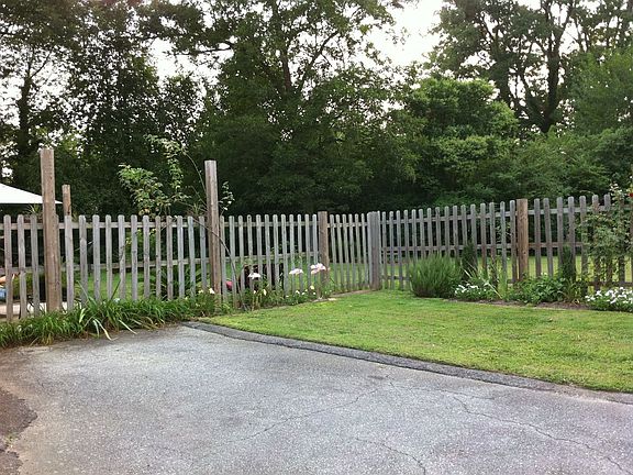 Yard between house and garage