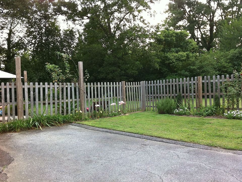 Yard between house and garage