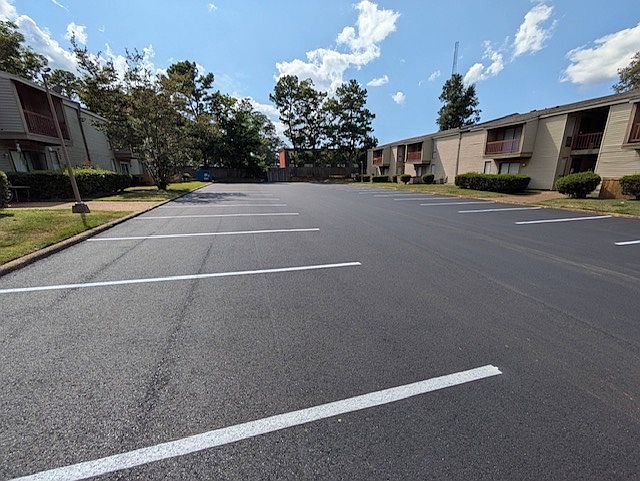 Newly paved, smoothe parking lot was installed in August of 2025