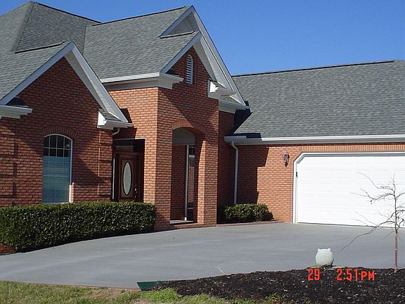 Concrete Driveway Leading to Oversized 2 Car Garage!