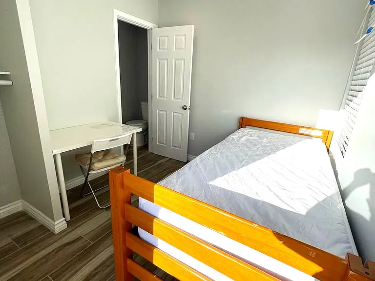 Bright, spacious room designed for both rest and productivity.