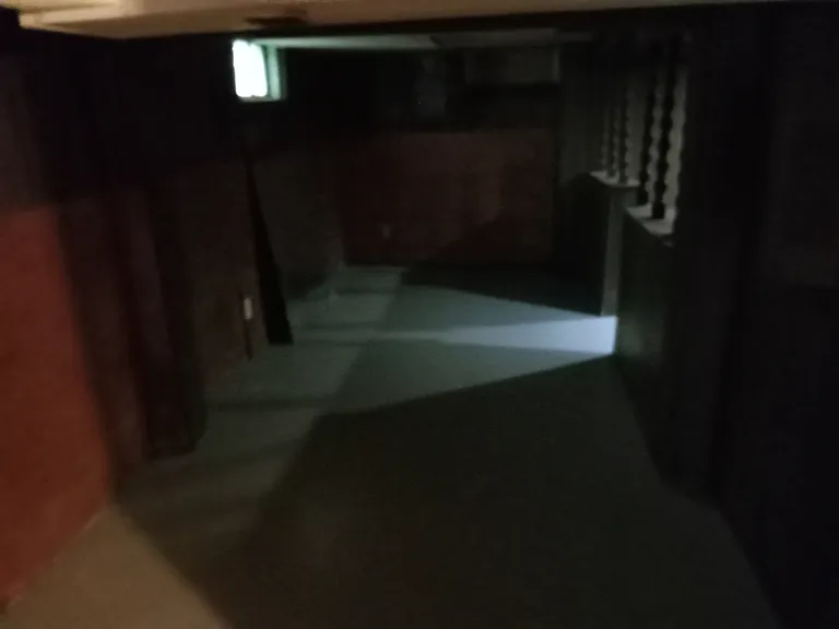 Further down basement hallway
