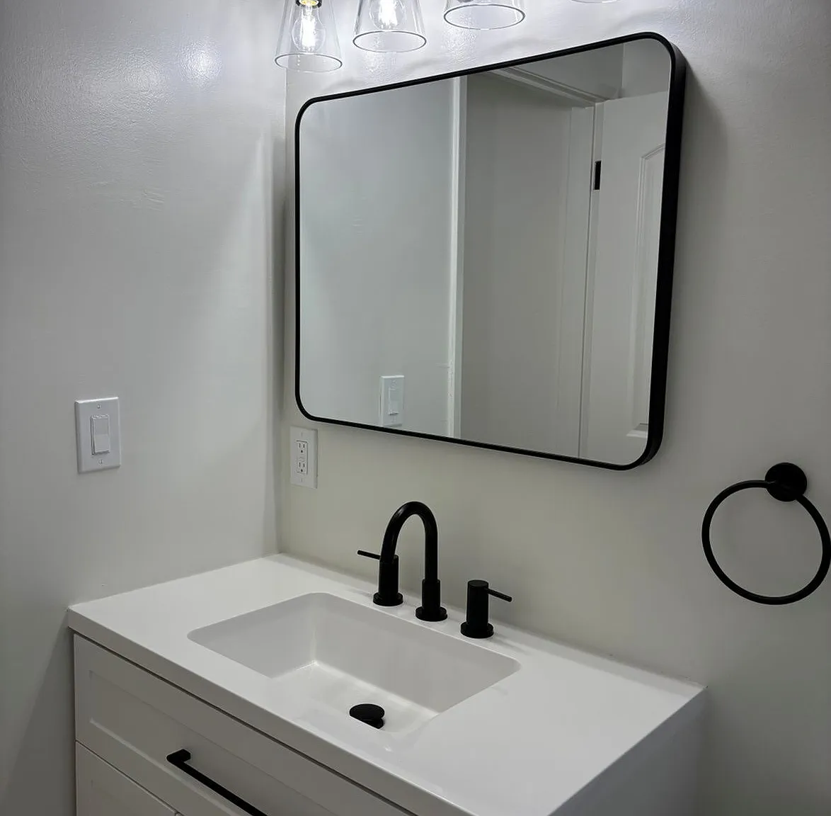 Modern tiled bathroom featuring sleek finishes, updated fixtures, and a fresh, contemporary look designed for comfort and style.