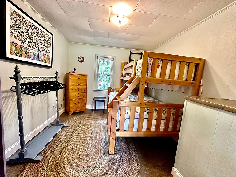 The third bedroom has a bunk bed, perfect for visiting guests.