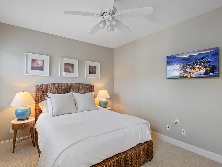 Upstairs bedroom 2, quite large, that is a queen shown