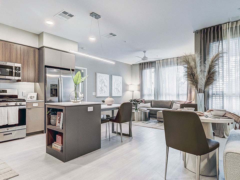 Griffis Platinum Triangle apartment kitchen with stainless steel appliances.