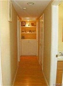 Hallway with extra large linen closets