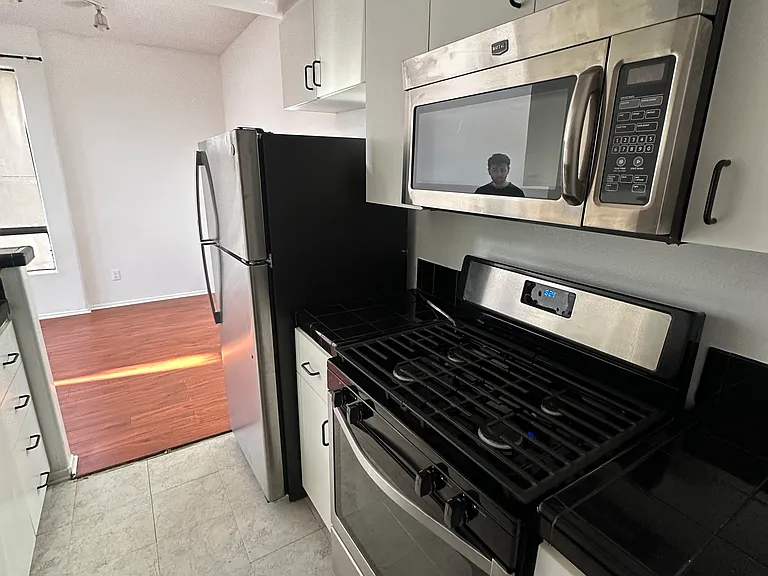Kitchen with stainless steel appliances