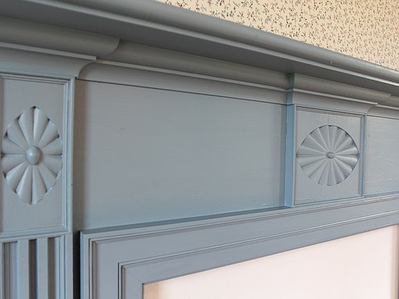 Parlor had carved mantel