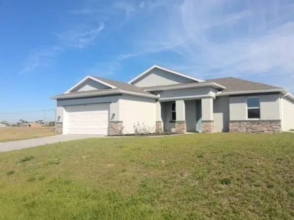 2115 NE 16th Terrace Cpe, Coral, FL 33909