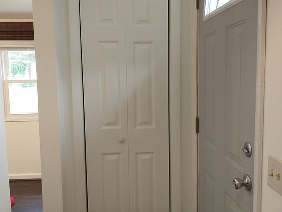 Front door with jacket/shoe closet.