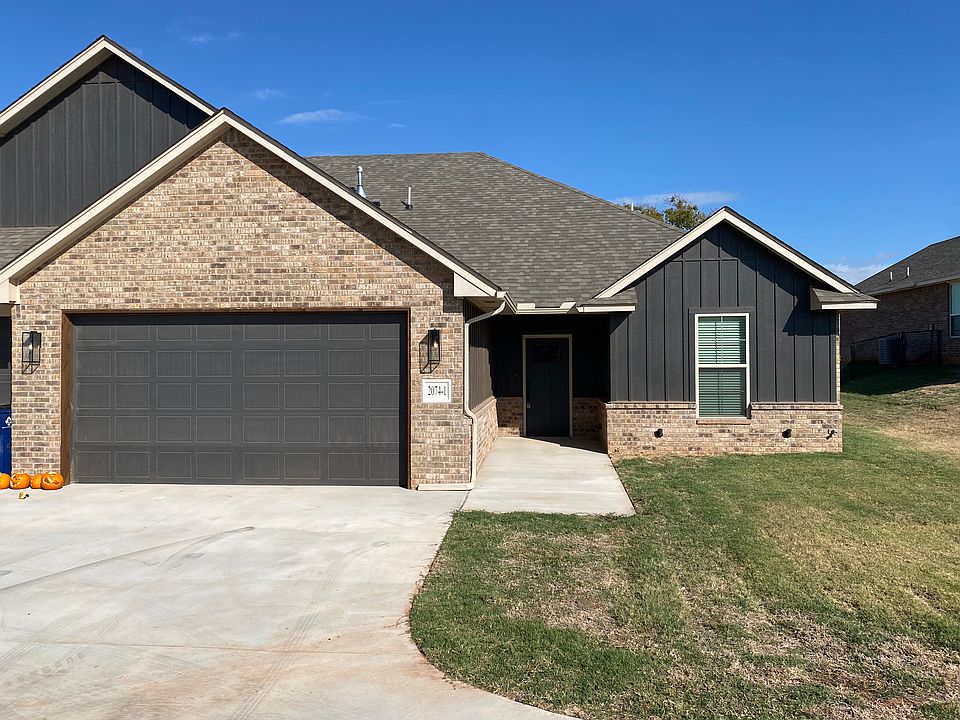 Front of Unit with 2 Car Garage