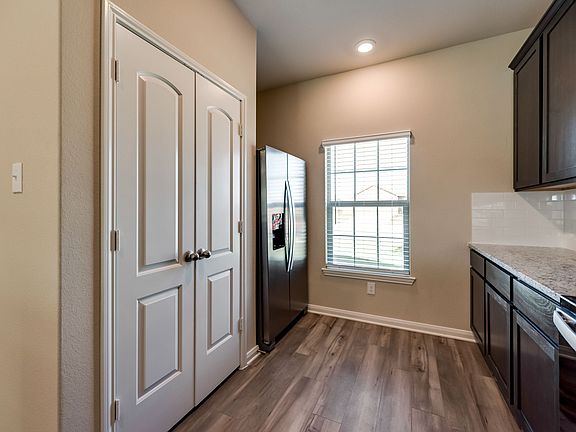 The stunning kitchen of the Driftwood plan.