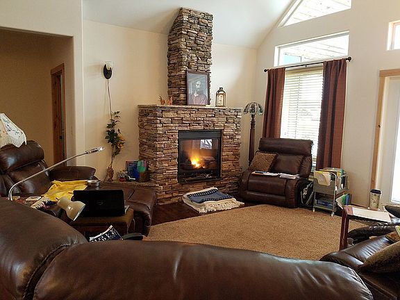 LR has fireplace, windows