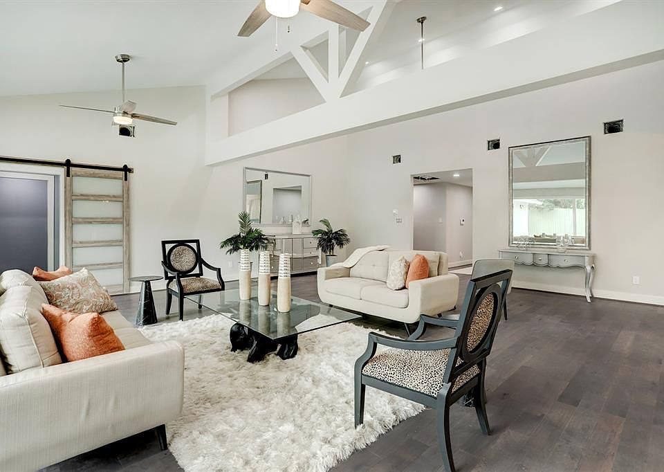 To the left is the Primary suite area. I love the color of the wood floors