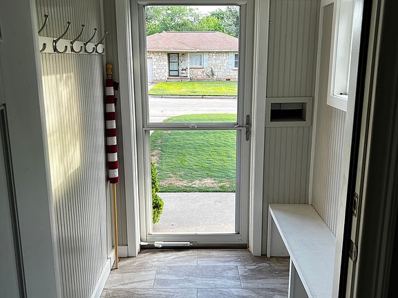 Front entry way Mud Room with bench and coat hooks