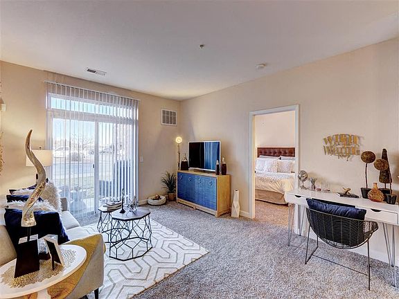Residence at North Penn living room with natural lighting