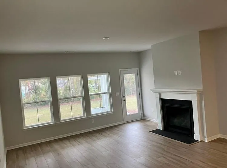 living room with outdoor screened-in porch