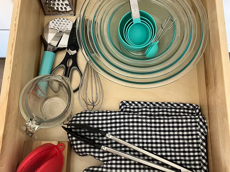 Baking and kitchen tools are included.