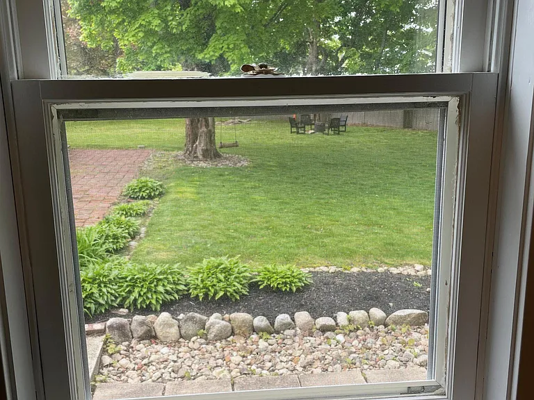 view of back yard from first bedroom