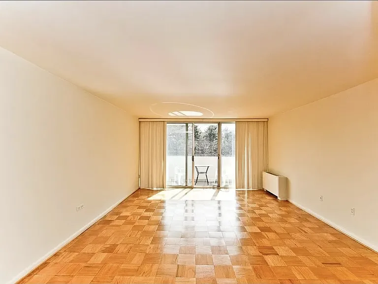 View of the living room and balcony door
