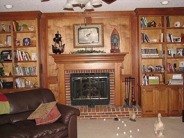 Den or Media Rm with custom bookcases and judges paneling