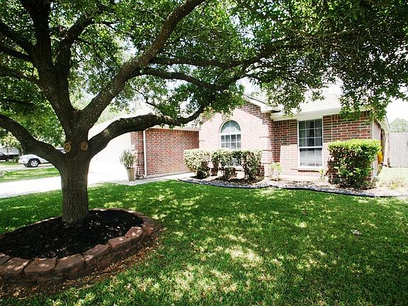 Mature landscaping to welcome you home.