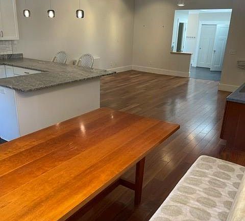 Breakfast nook, looking to back entry and 1/2 bath