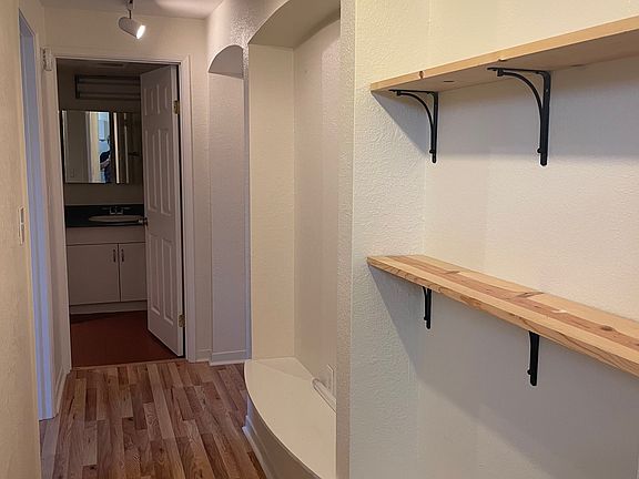 Hallway with built-in for storage / art.