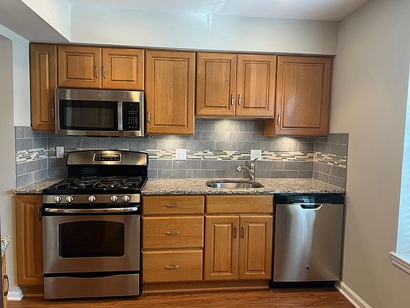 Kitchen, gas stove, dishwasher and microwave