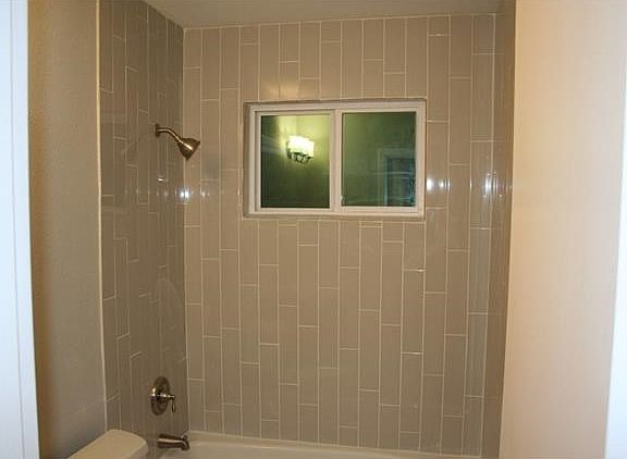 vertical subway tile in tub