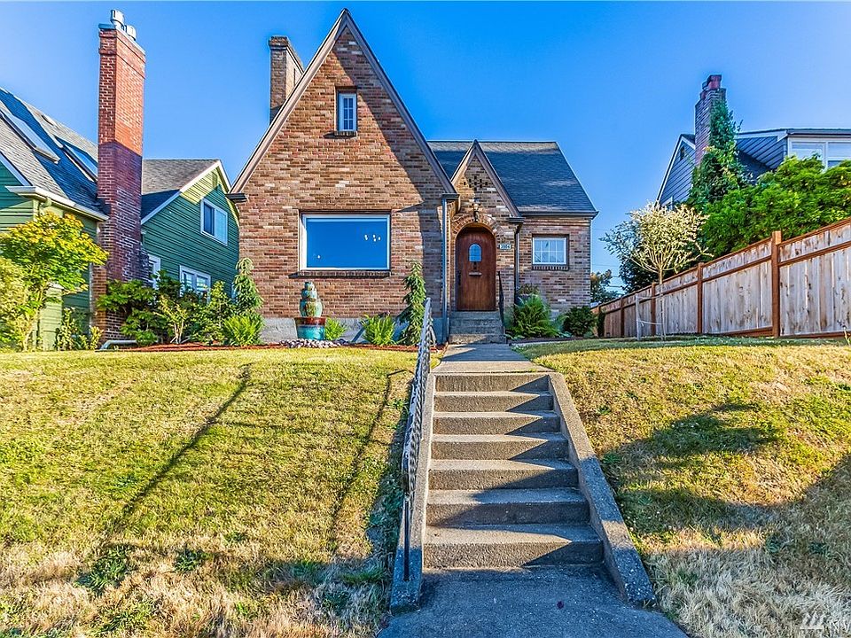 Enjoy Tudor elegance in this delightful North Tacoma home, only moments from UPS. Nestled on a spacious lot, an ideal combination of Craftsman charm, privacy and ample opportunity for your creative expression awaits you.