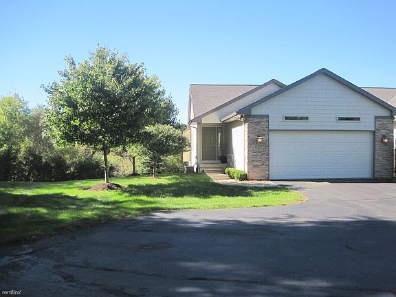 Front view of end unit condo.