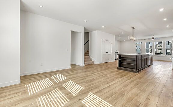 Dining area. Stairs up to 3rd floor bedrooms.