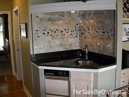 Wet Bar : Granite counter, stainles sink, wineglass storage