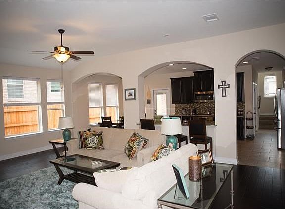 Open plan connects kitchen to breakfast area and family room
