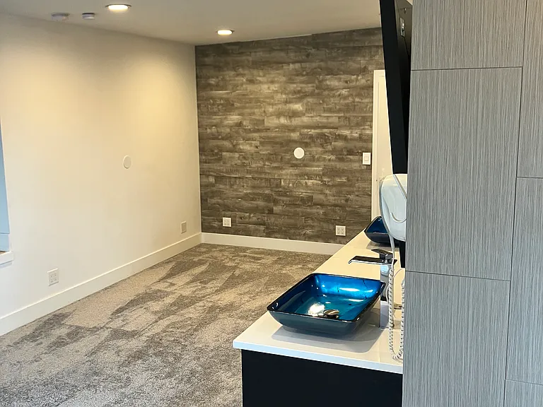 Master (primary) looking Southeast. (Note: walls are blocked and tubed for TVs)