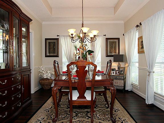 Formal dining with trayed ceiling.