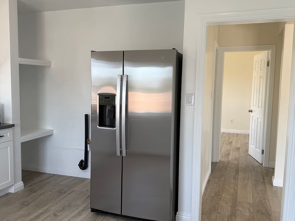 Kitchen
New GE Refrigerator with water dispenser and ice
Washer/Dryer hookups available
(Space for stacked washer/dryer on left side of refrigerator)
