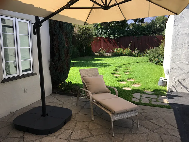 Rear patio for relaxation or outdoor dining